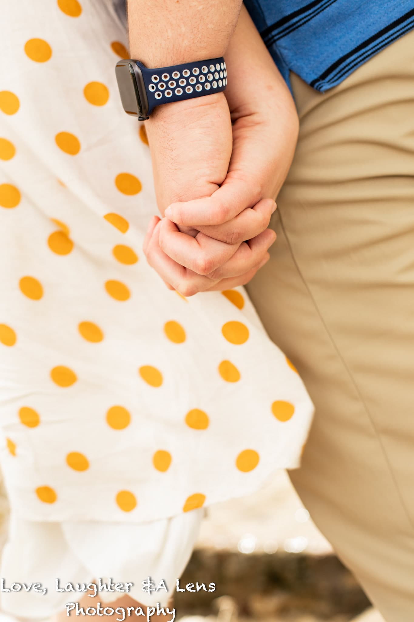 Close-up of a couple holding hands